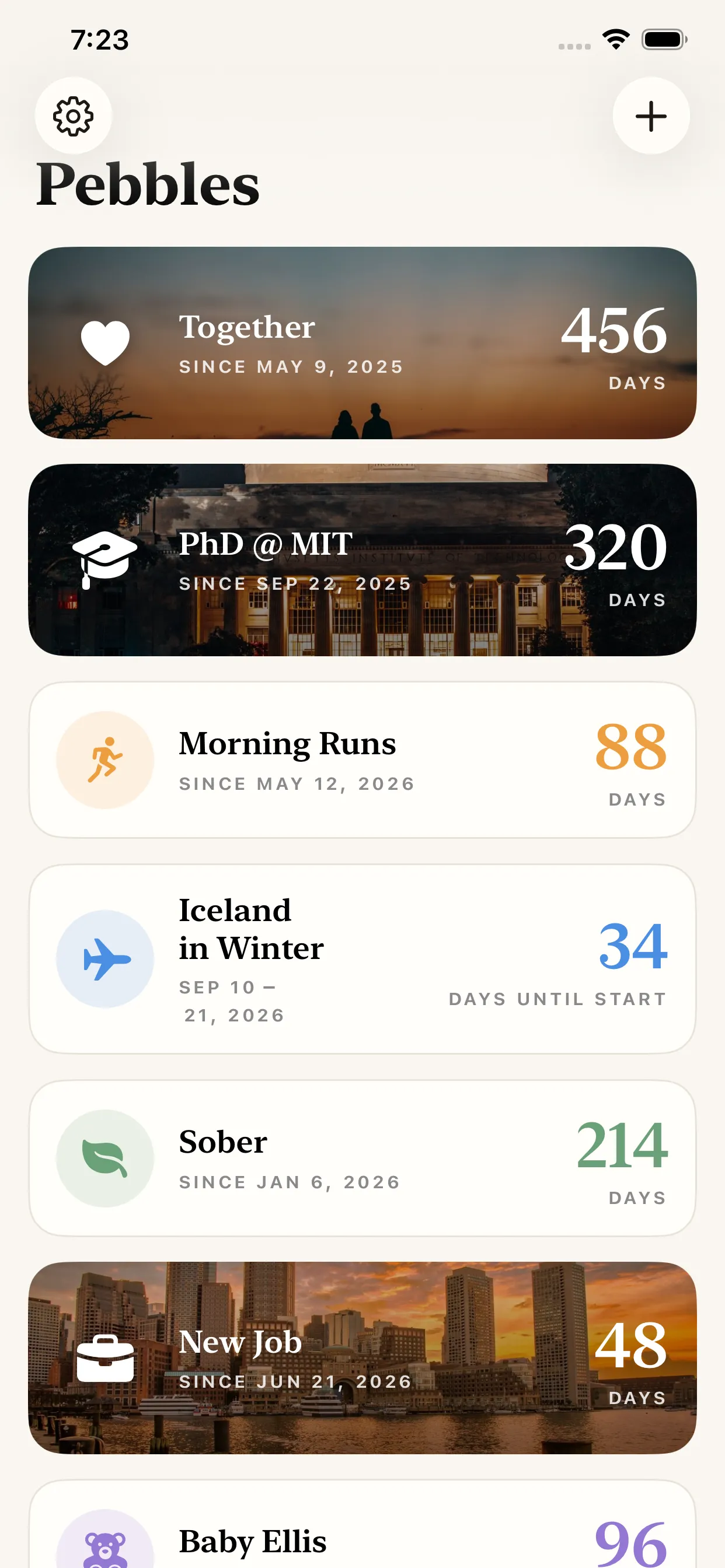 The Pebbles home screen listing eight paths, some over a cover photo and some with a coloured symbol: Together at 456 days, PhD @ MIT at 320 days, Morning Runs at 88 days, Iceland in Winter 34 days until it starts, Sober at 214 days, New Job at 48 days, and a Baby Ellis countdown where the list runs past the bottom of the screen.